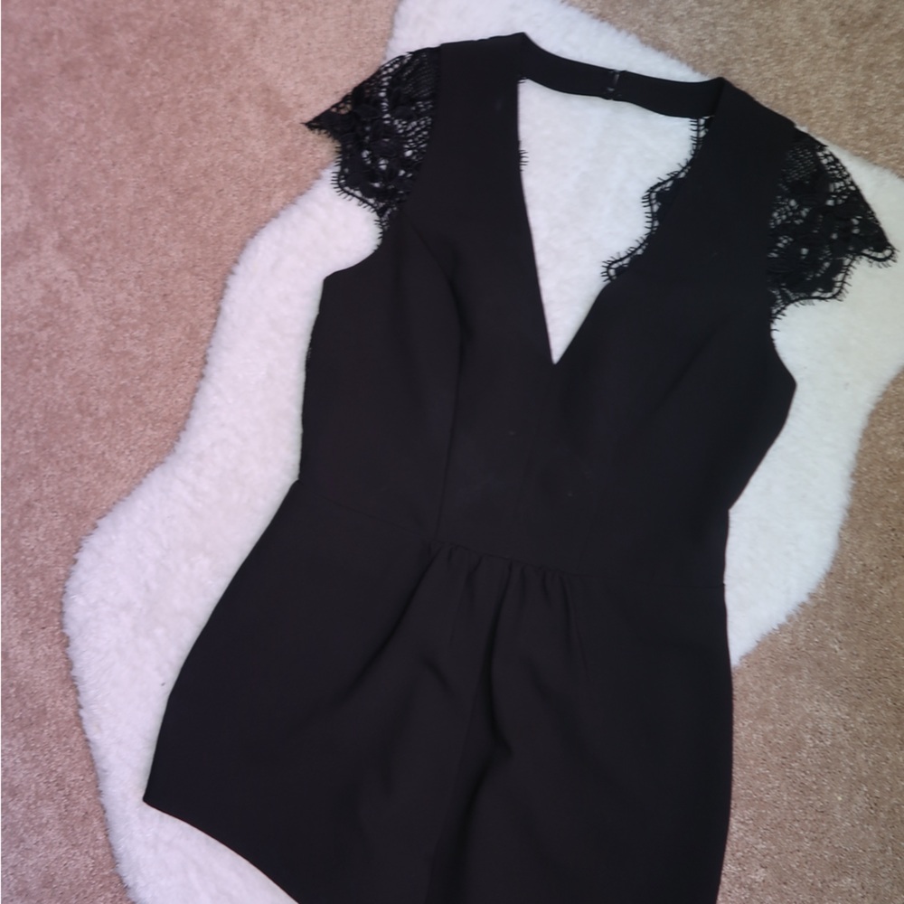 Storee Black Romper with Lace Sleeves